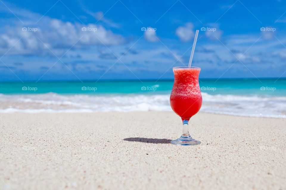 Red Smoothy On A Beach