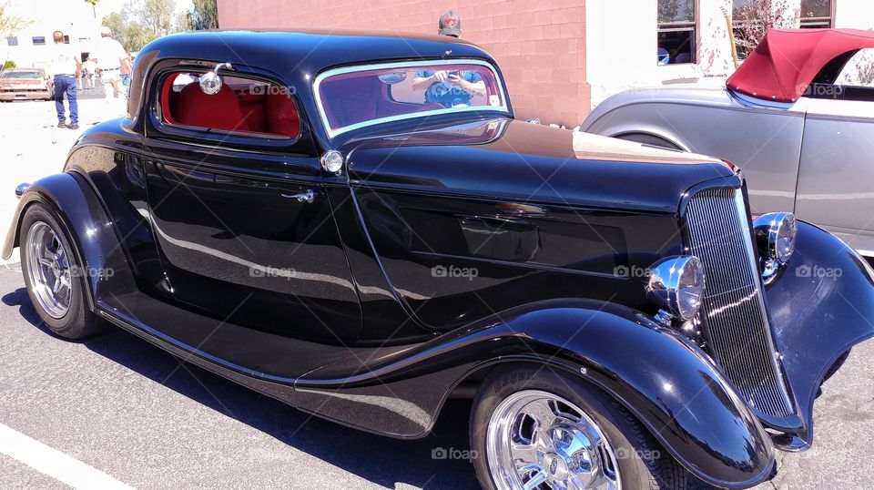 Red velvet interior and midnight black paint on a 1932 Ford Coupe