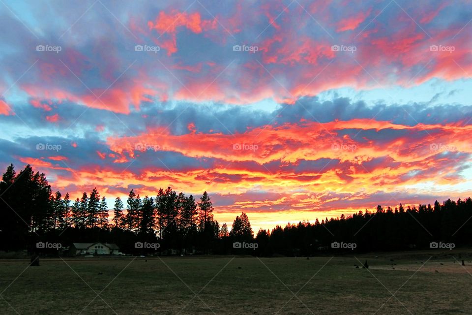 This happens very rarely.  At that time, it seemed that not only was the sky burning, but the whole universe was engulfed in fire.  It was a stunning sunset.  And I was very glad that at that moment my camera was in my hands.