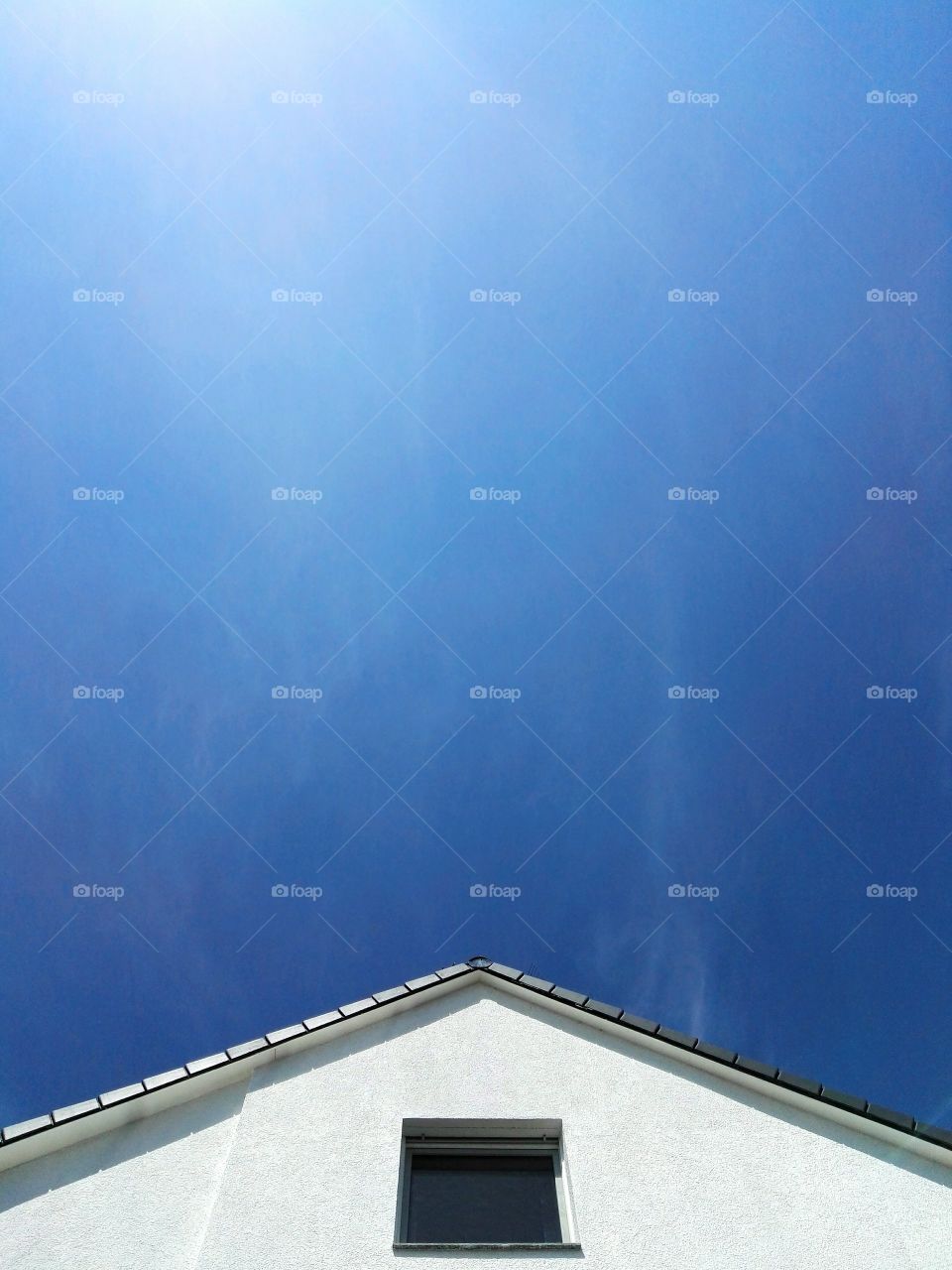 Low angle view of roof and clear sky
