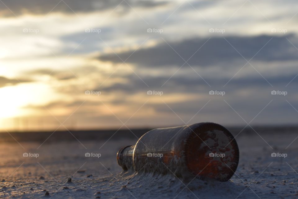 An old beer bottle at the salt flats 