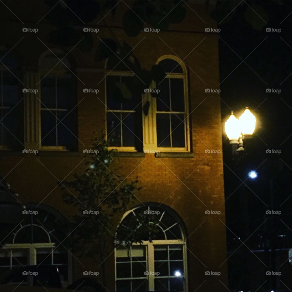 Brick building and lamp light 