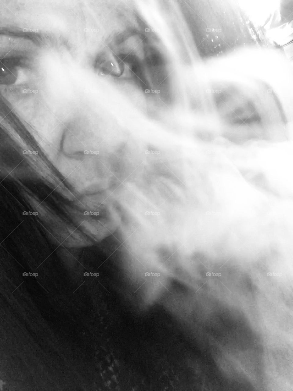Selfie in black and white while vaping