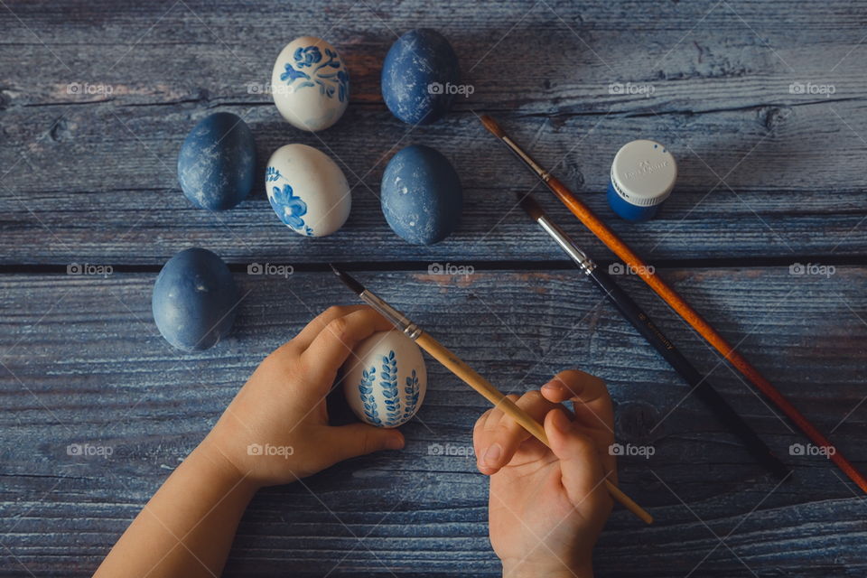 Easter in rustic style with child paintings 