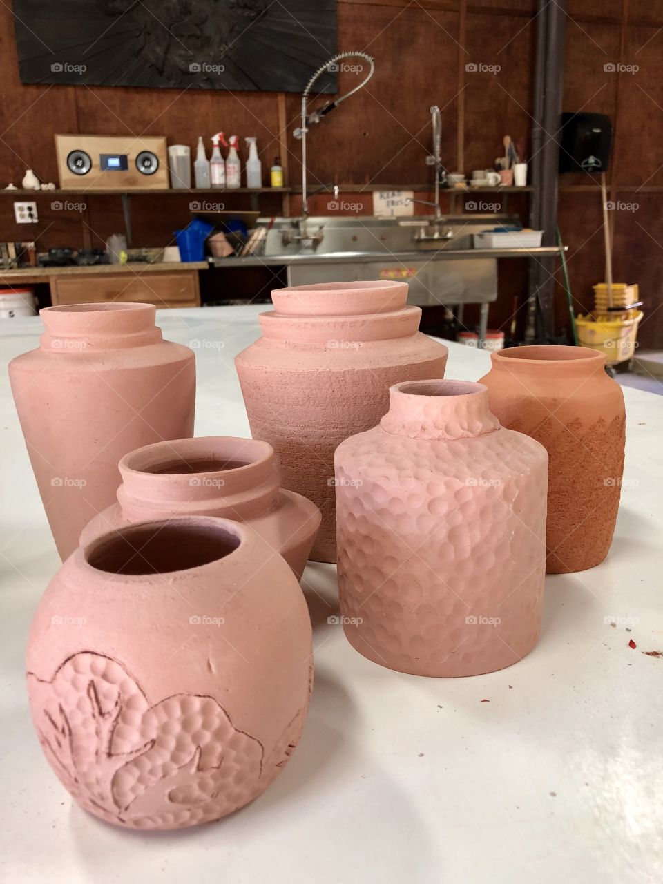 Glazing ceramics at the studio 
