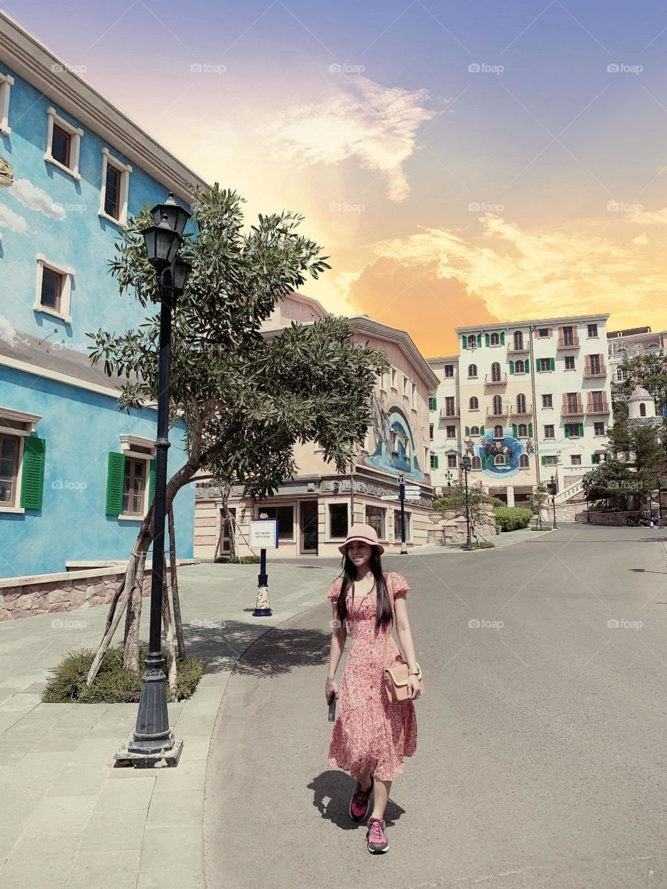 The girl explores the beautiful tourist city in Vietnam