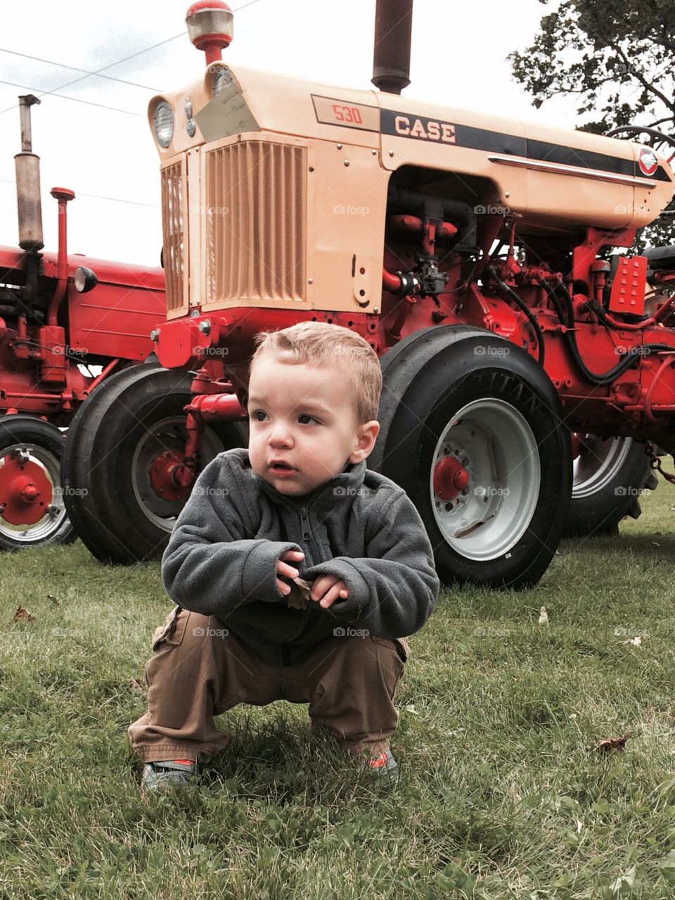 Real boys like Case. Tractor show at church. My son loves tractors.