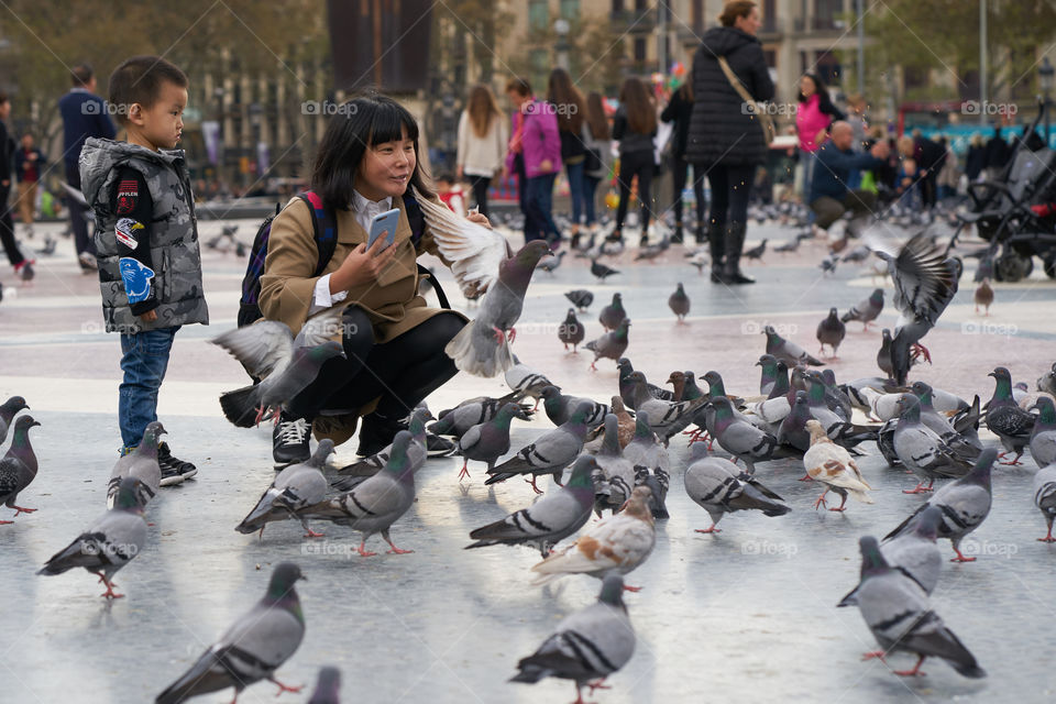 Mother, son and Pigeons 