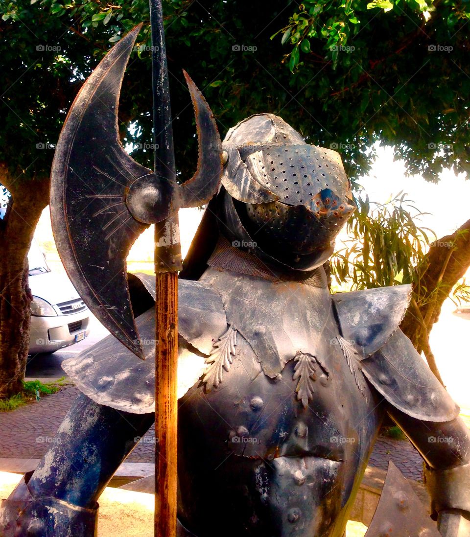 Close-up of an ancient armor with axe