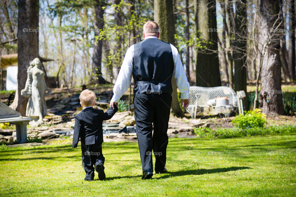 Groom and son on wedding day 
