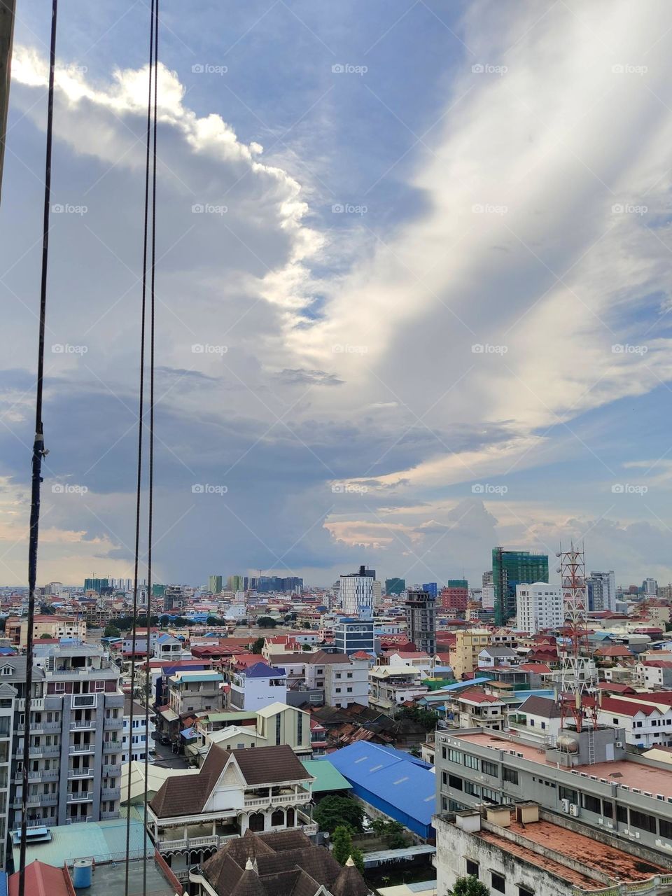 Wings link clouds over Phnom Penh Cambodia