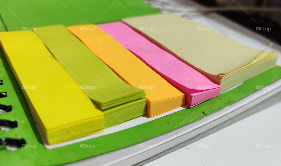 Vibrant colorful eye-catching sticky notes with Dairy for Office work and to do task