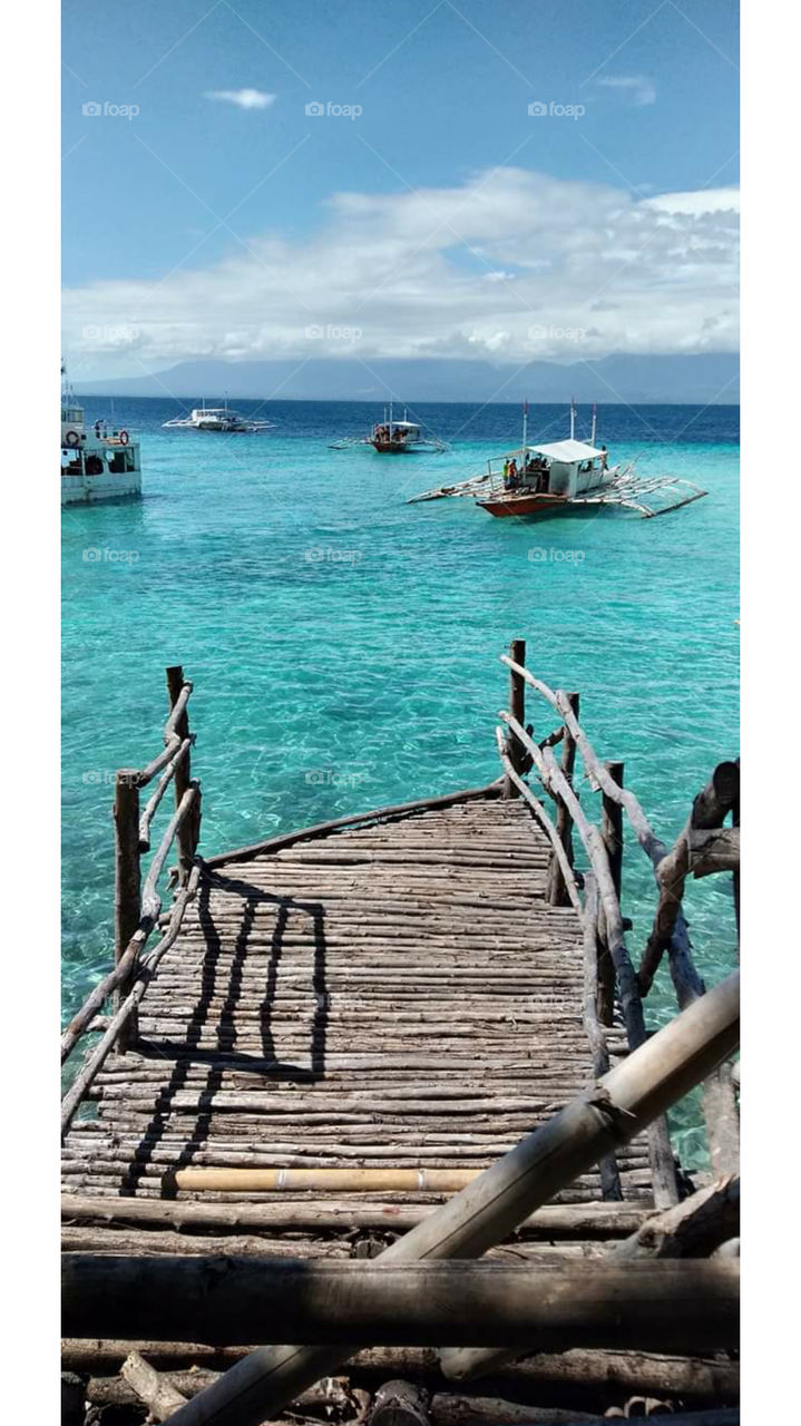 No need for filter in this beautiful Island of Sumilon, Cebu. 
#island #bluewaters #water #dock #boat #blue #gatorade