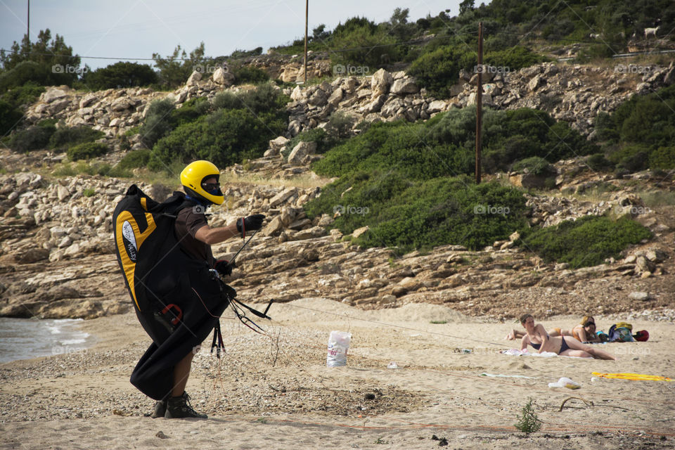 Parachutist landed. parachutist landed on Beba beach,near Skala Marion on Thassos island,Greece