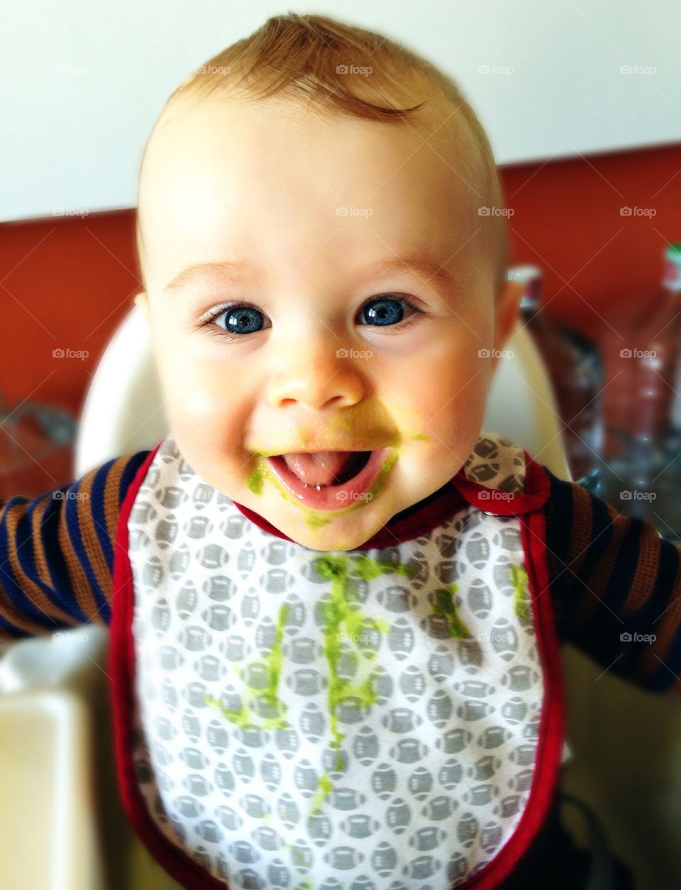 Sweet pea. Baby eating peas