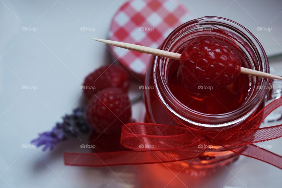 A glass of raspberry juice