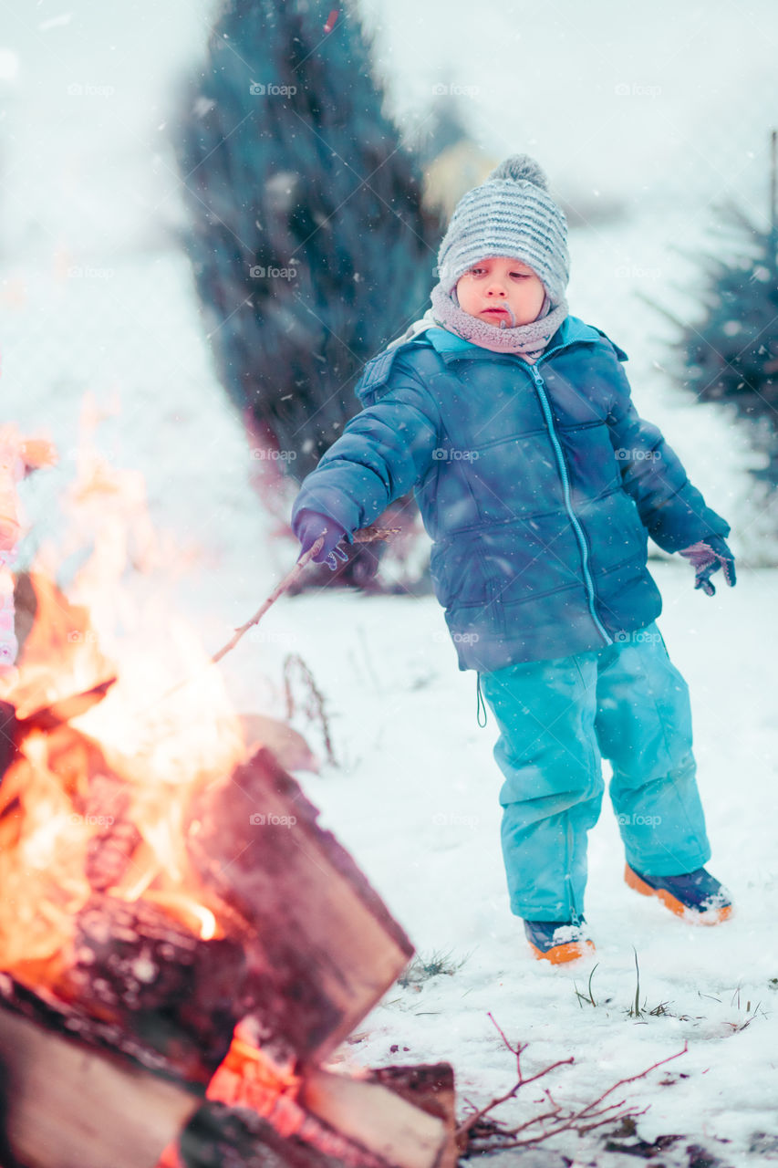 Winter with friends. Spending wintertime outdoors playing with snow