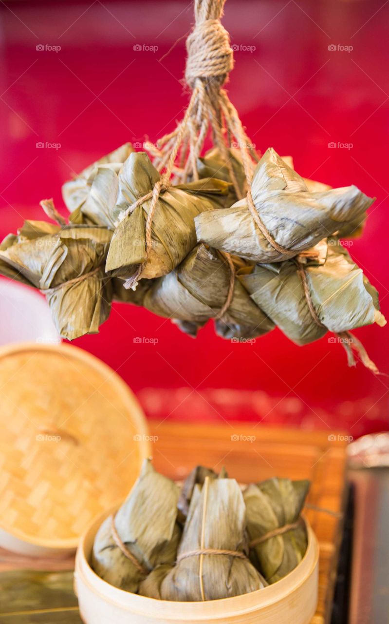Chinese rice dumplings bring made and hung to dry