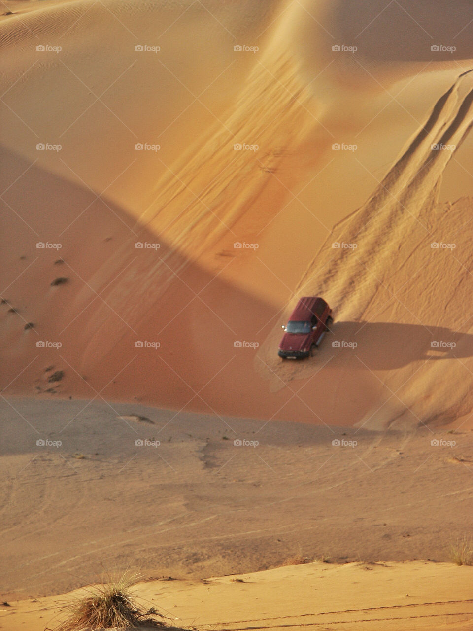 car driving sand desert by chrisc