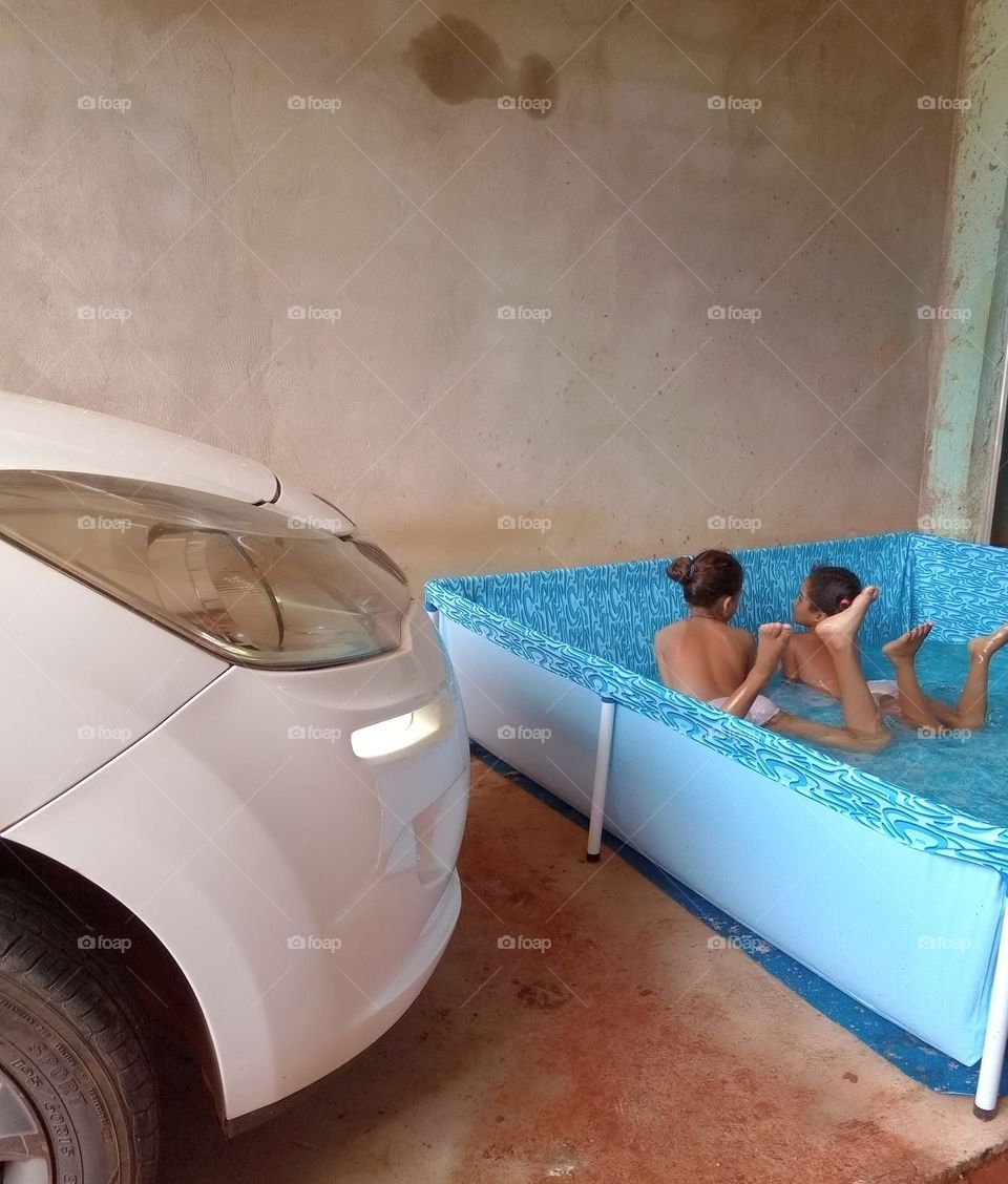 Editors'Choice Photo of the week Crianças brincando na piscina