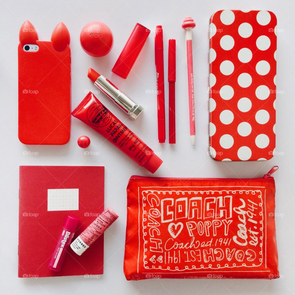 Red color story : Red items flat lay.