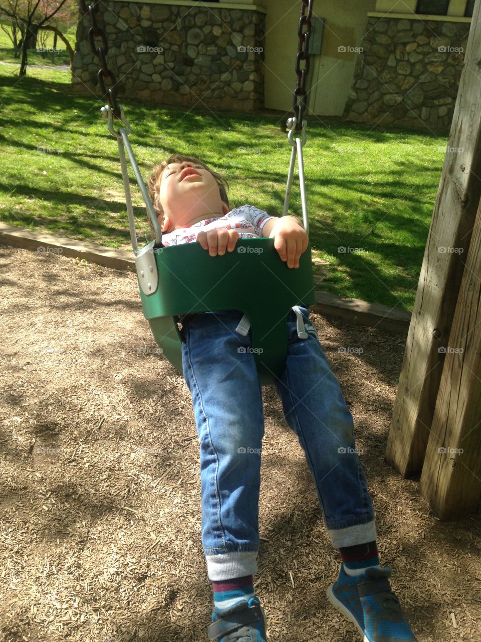 Asleep on the swings!
