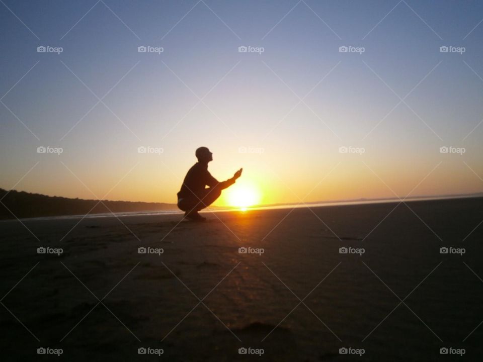 Sunset Crossing fingers 