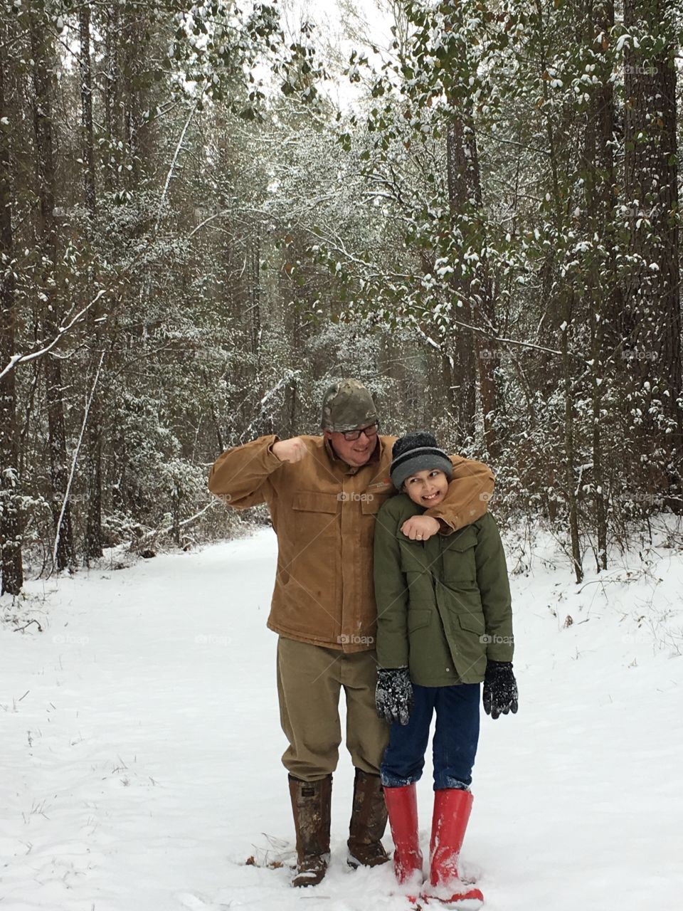 My husband and son goofing off in a rare Vidalia GA snow. 