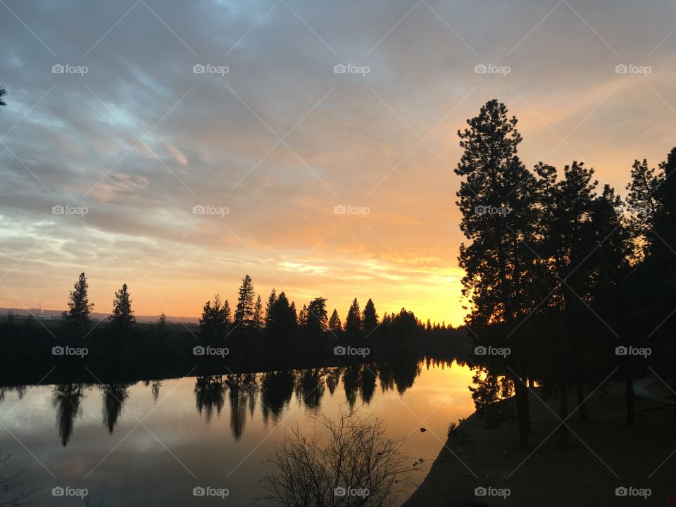 Spokane river reflection at sunset