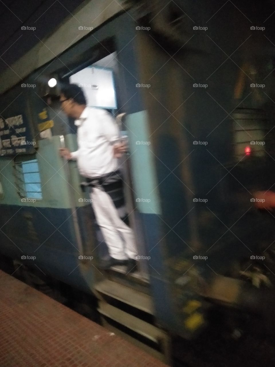 Guard on duty at Bandel station in Howrah Rampurhat 1st passenger train