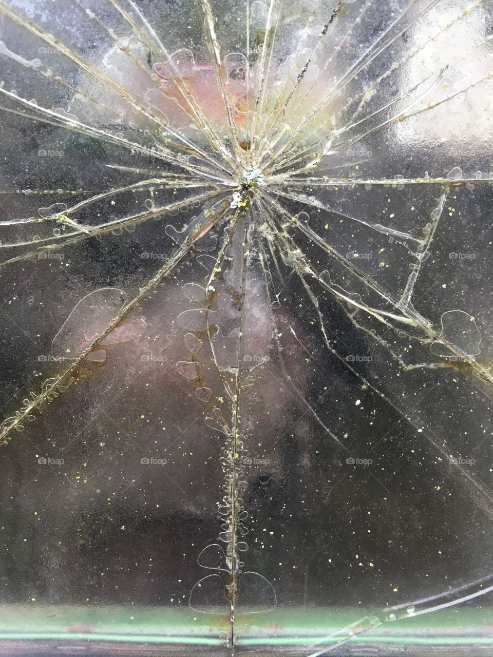 Broken glass in vintage car window
