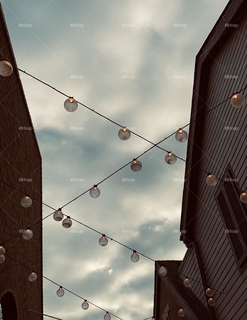 Holiday lights are up in the air this year. Quite literally! Super fun decor, on a cold cloudy morning. 