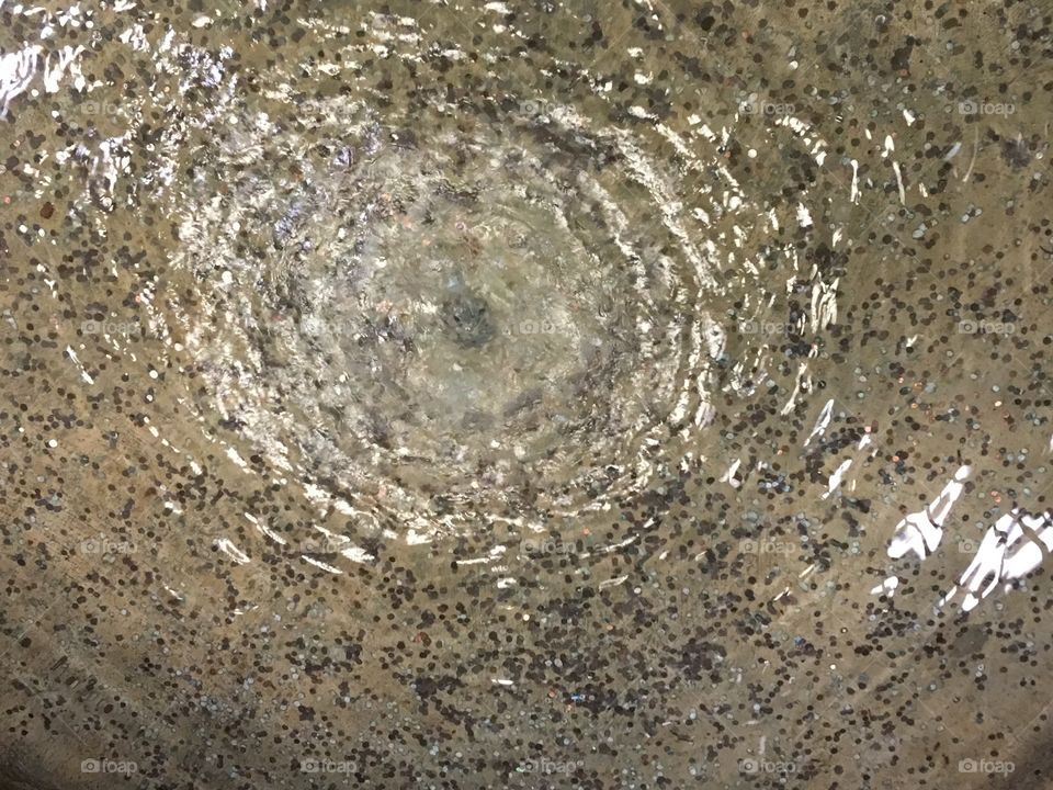 Top of frame water at fountain drain