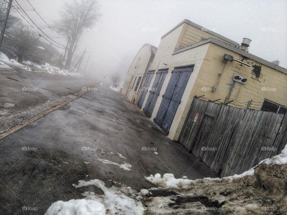 The fog of Gray street. Melting Winter snow on an early morning featuring the labatt Brewery