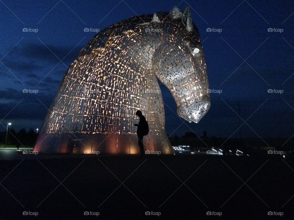 Sons favourite gadget... his mobile phone ... catching Pokemon at The Kelpies, Falkirk 