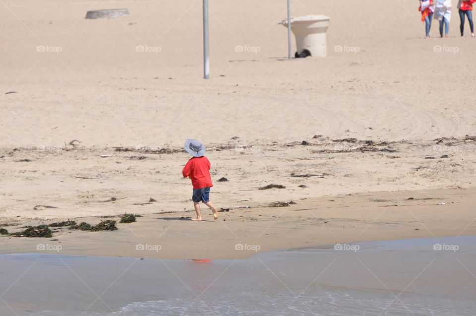 Boy playing with sand