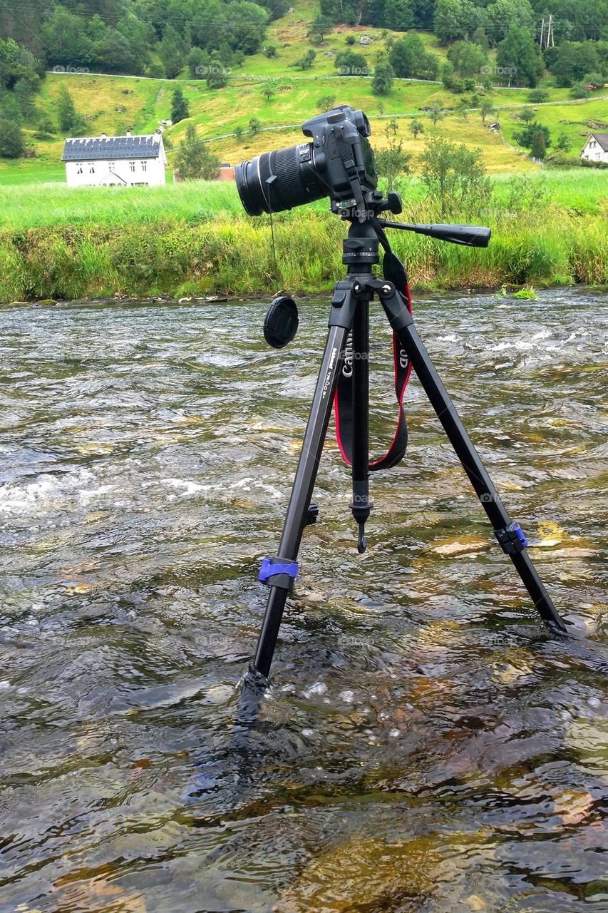 Tripod in the river 