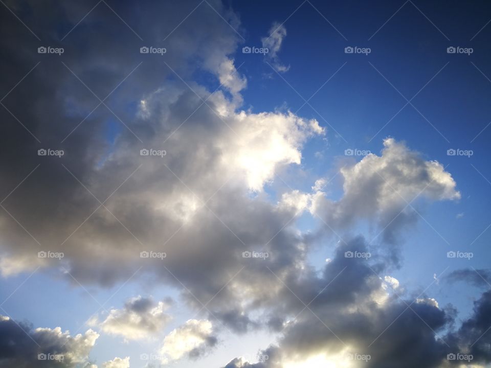 Blue sky with white clouds.