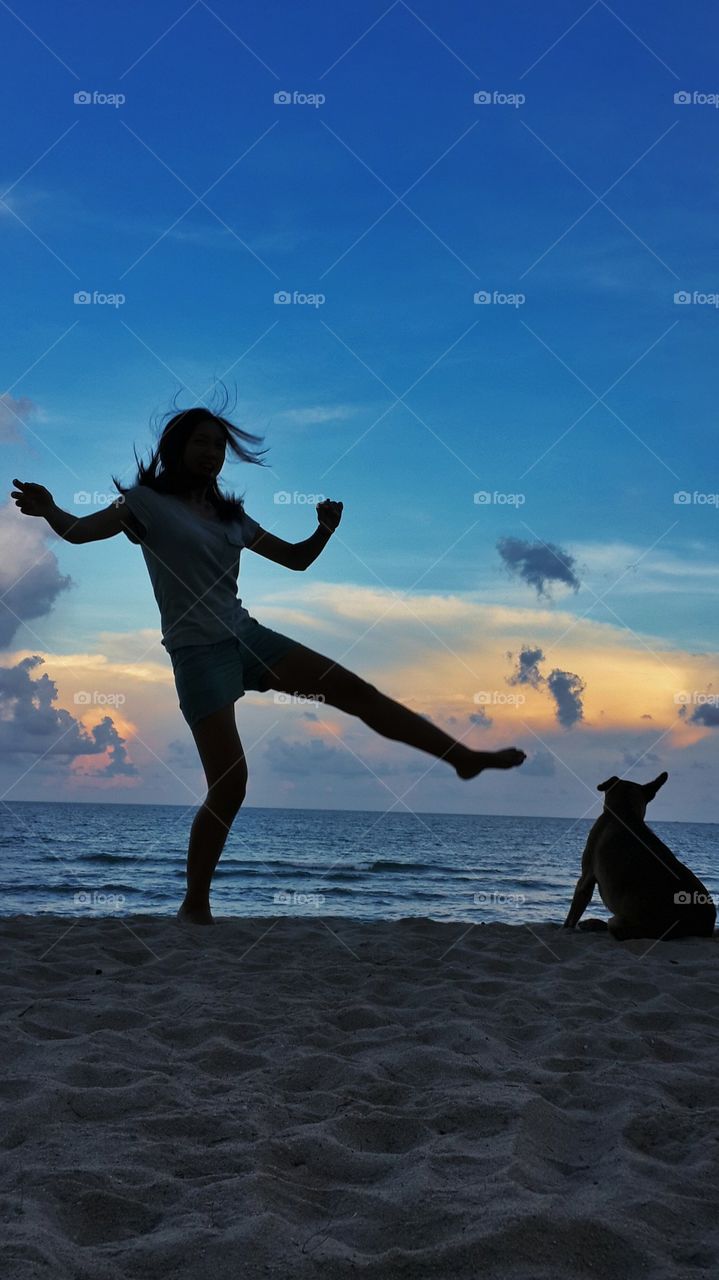 Playing with dog on the beaches.