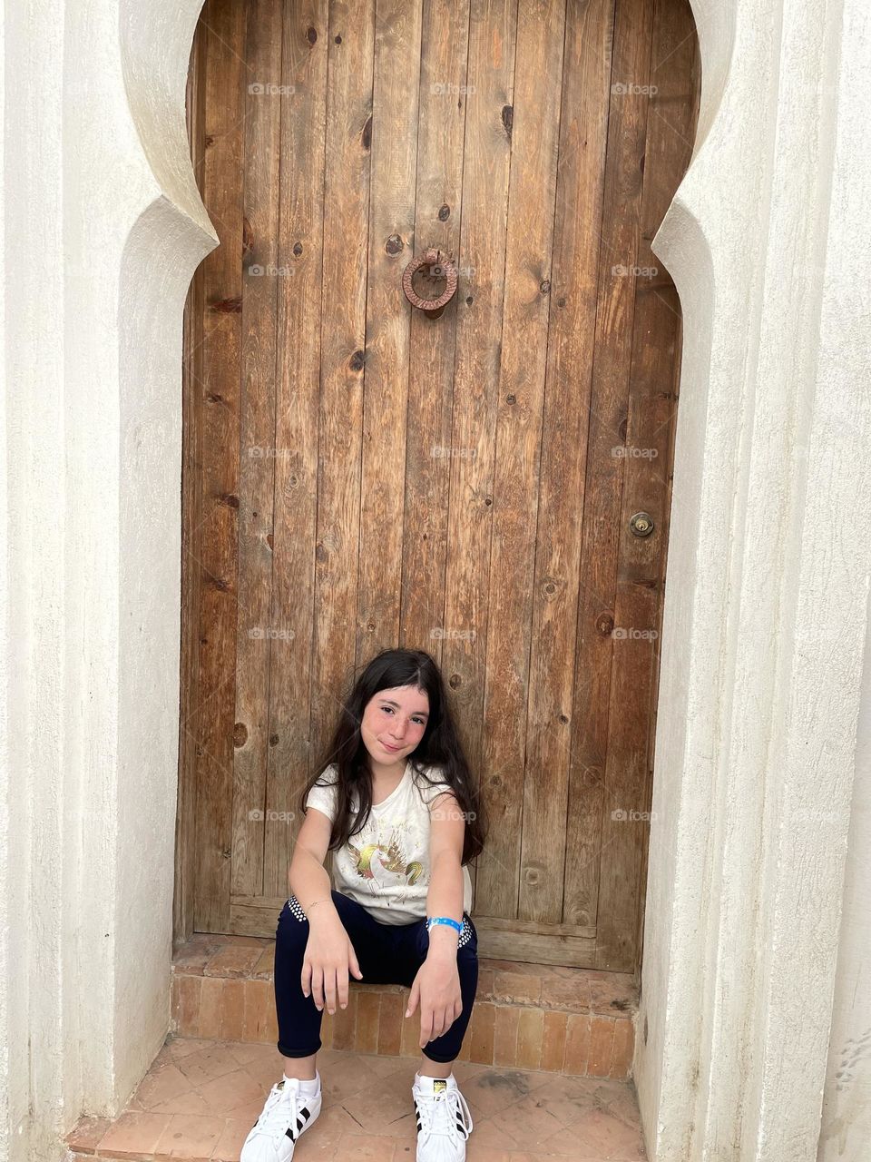 Girl taking an afternoon break in the Medina of Marrakech Morocco