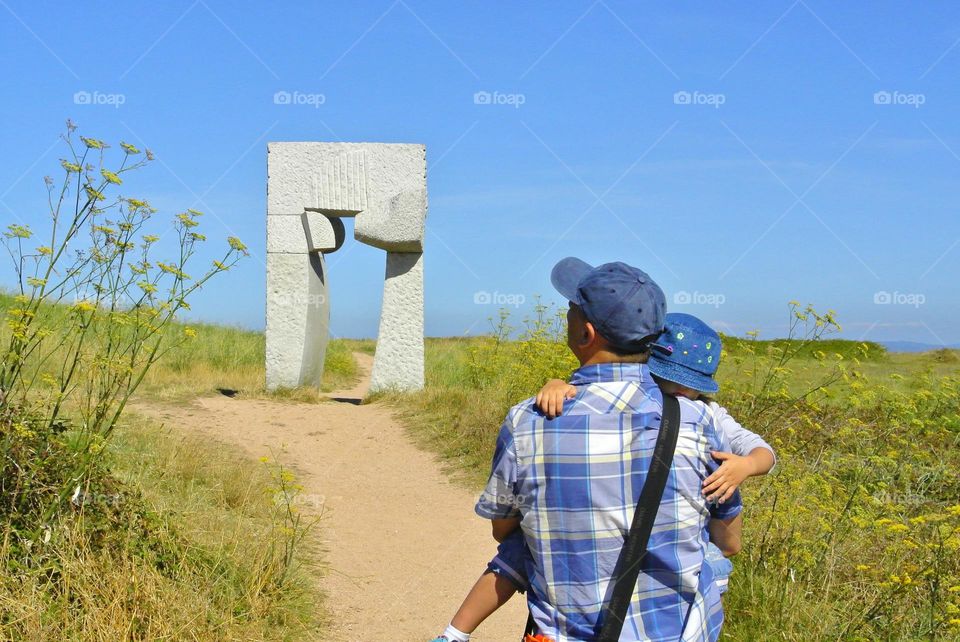 dad carrying his daughter