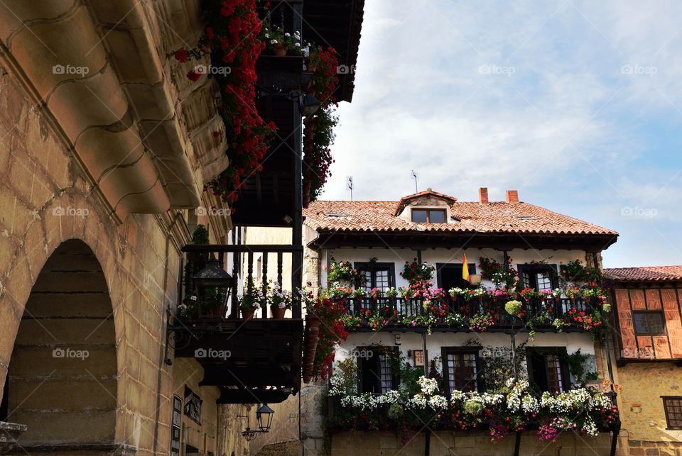 Houses with beautiful balconies in Santillana del Mar, Cantabria, Spain.