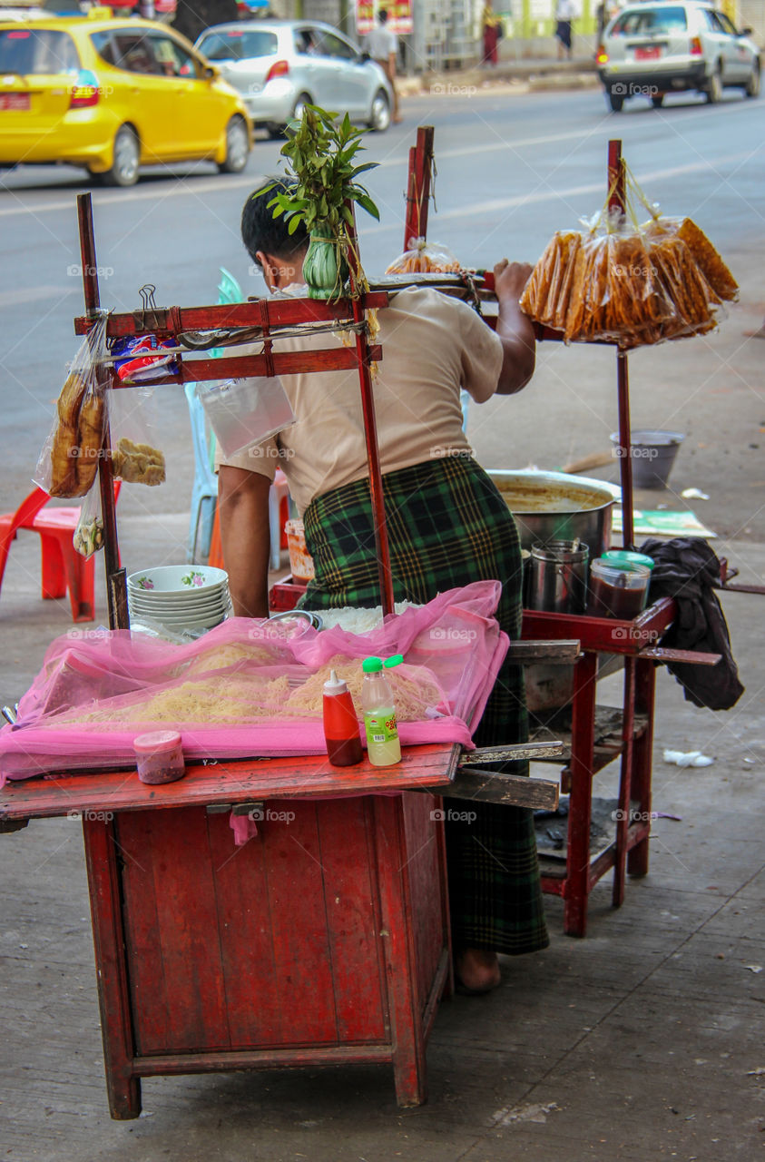 Talk about a mobile restaurant, this man is taking his whole kitchen and restaurant on his back to set up shop Ina better street location