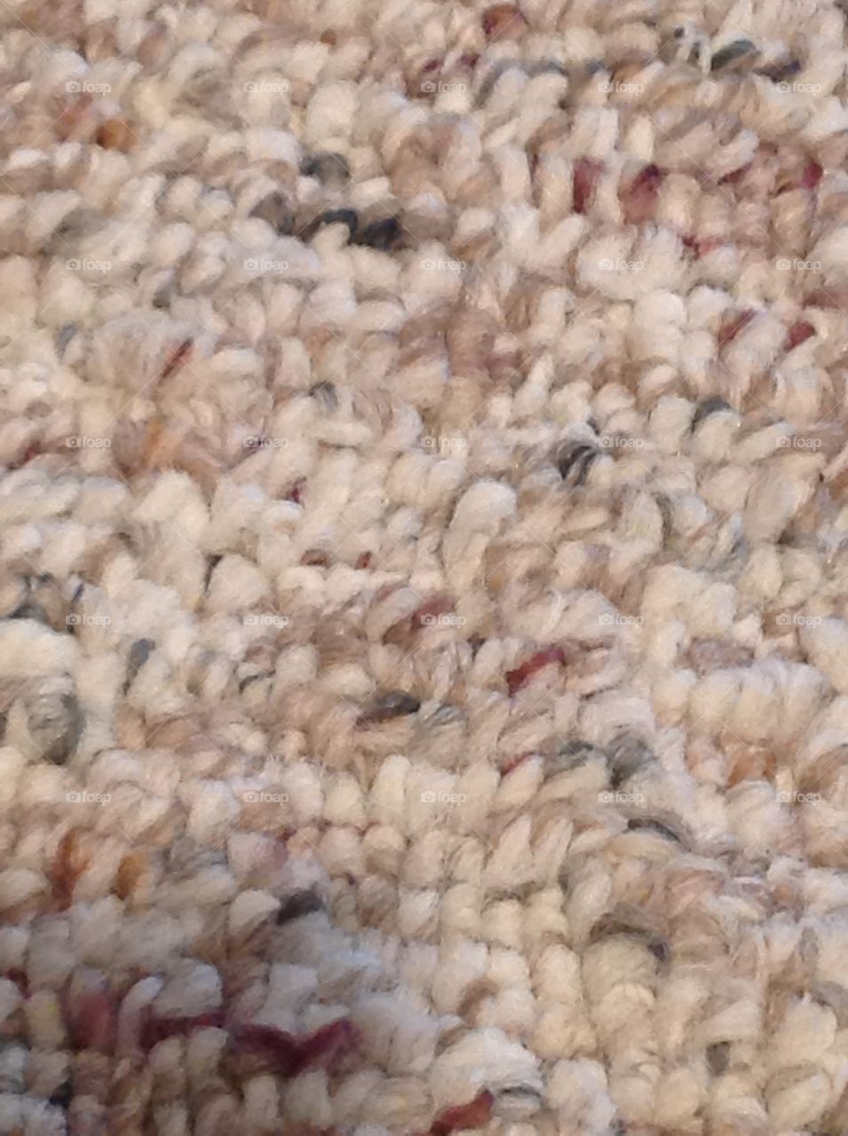 A close up of rug fibers.