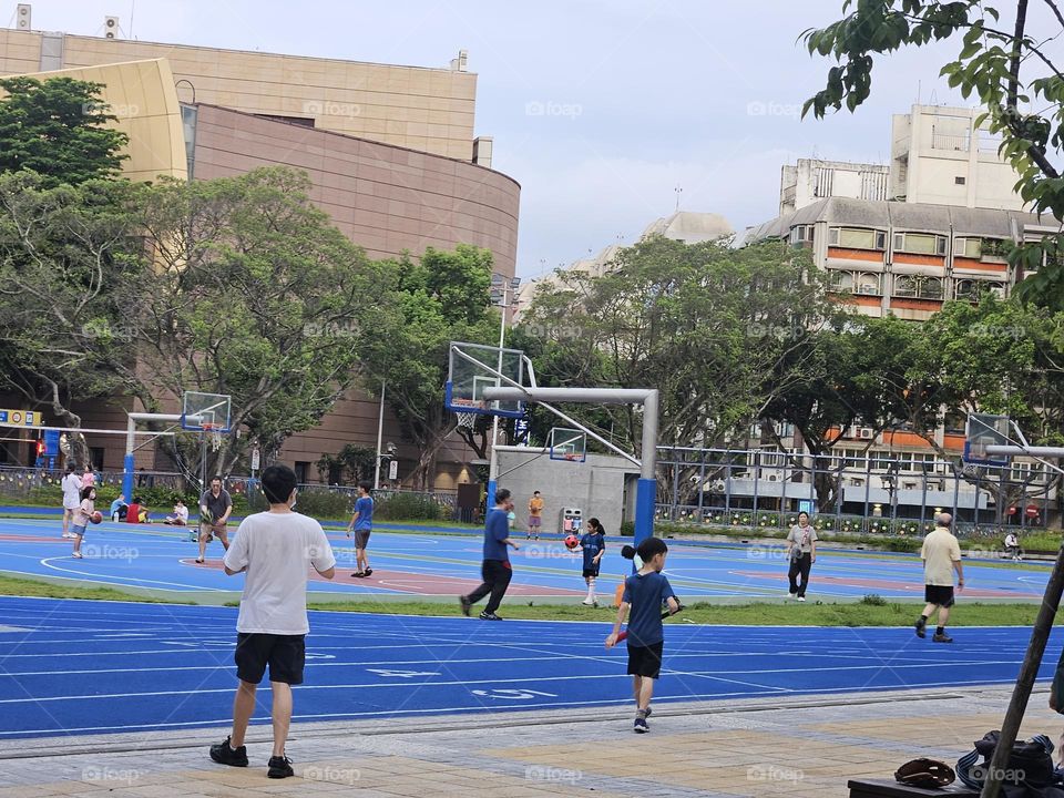 People are active on the campus playground during holidays
