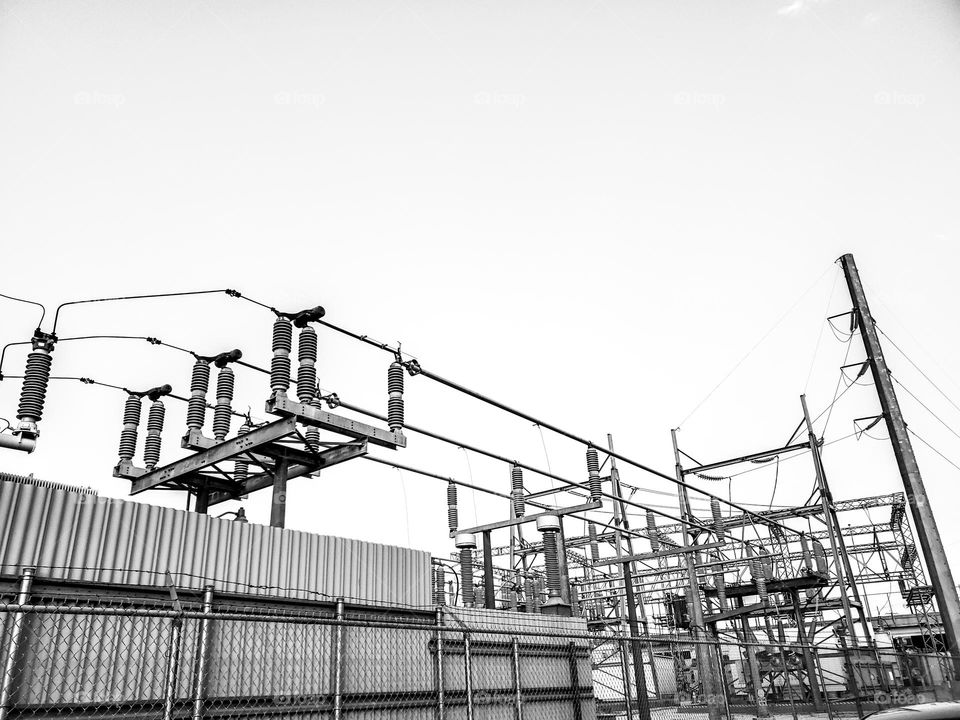 Architecture in black and white.  Electrical power substation structures.