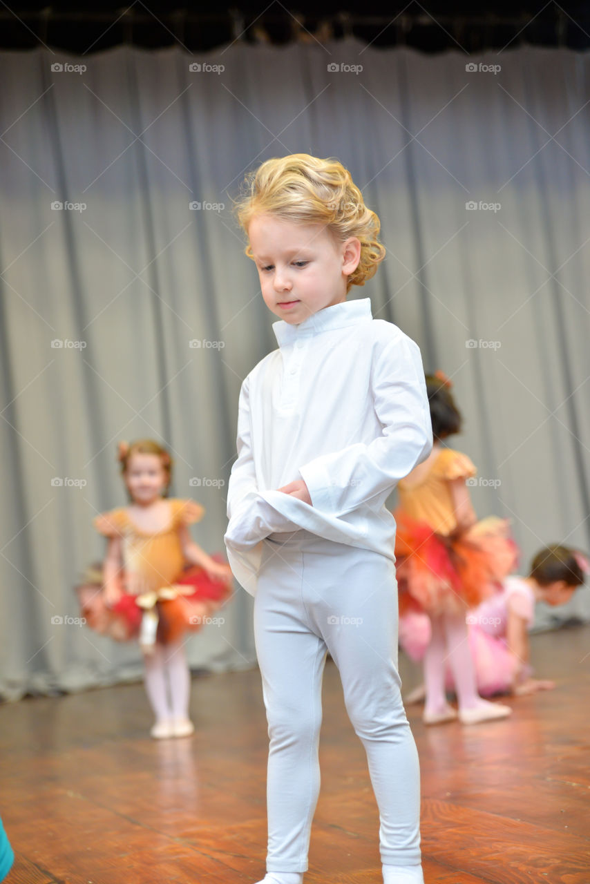 Boy and girls dancing ballet