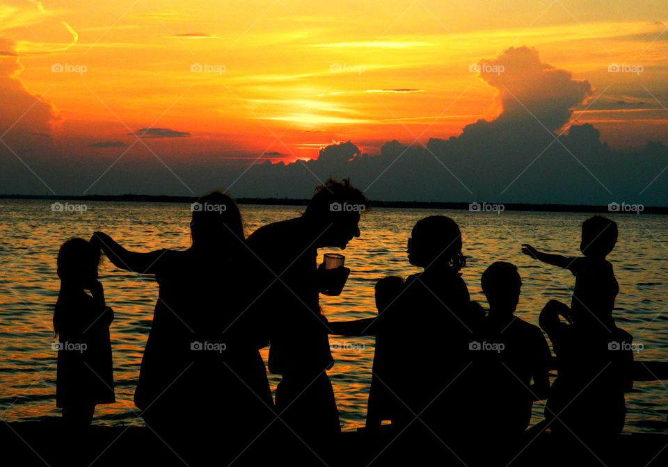 Family Affair!
Family members gather in the recreational area to observe and photograph the magnificent sunset!