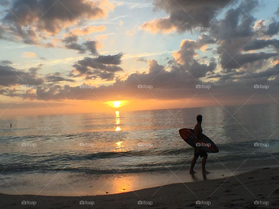Surfer at Manasota Beach, FL