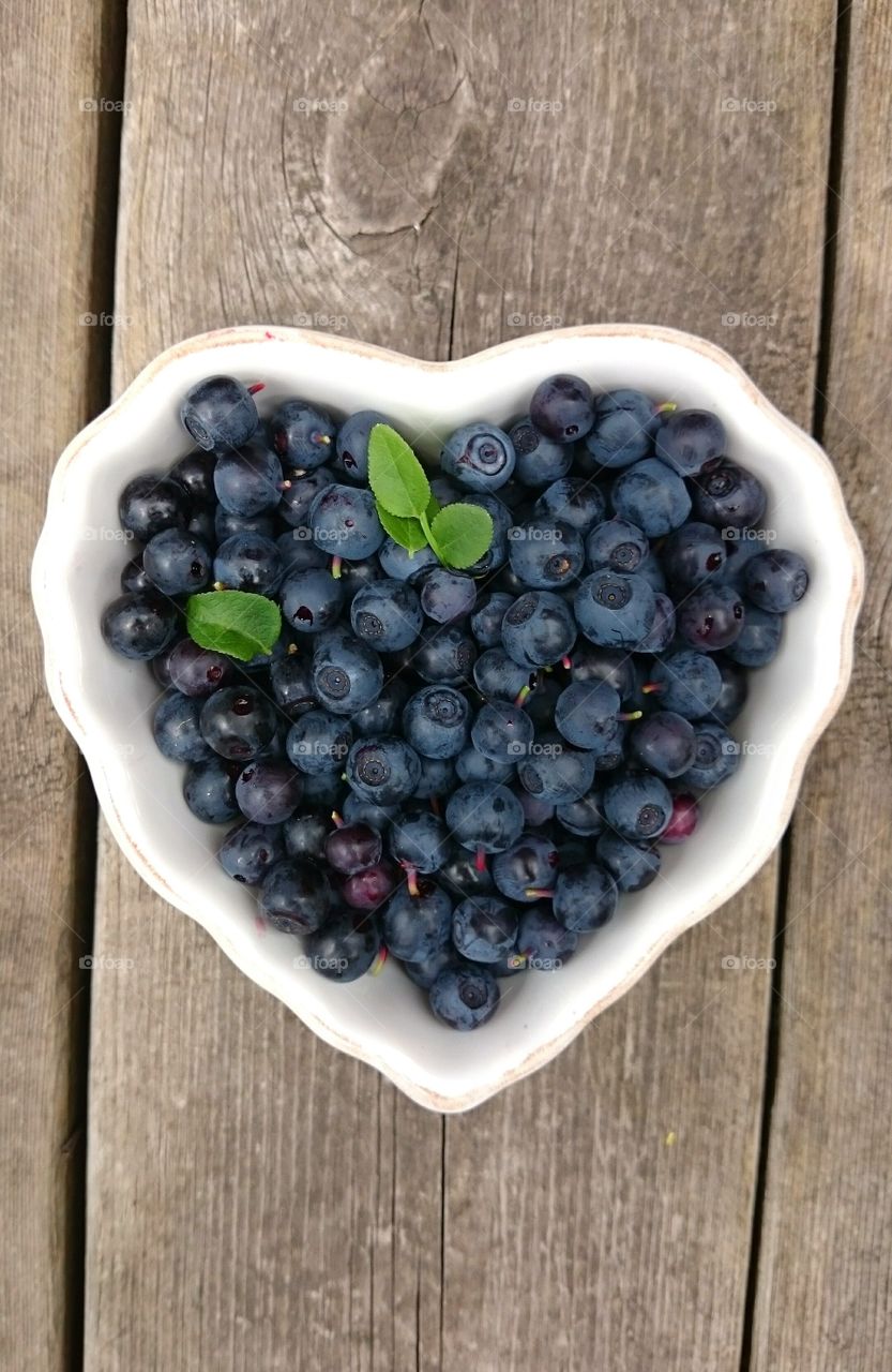 Blueberries in a heart bowl